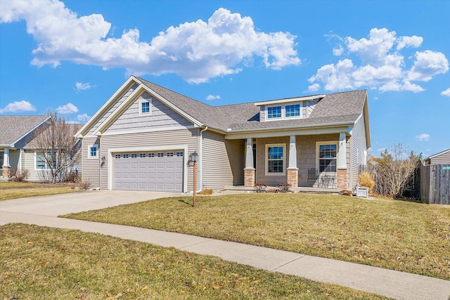 craftsman house featuring fence, driveway, a porch, an attached garage, and a front lawn