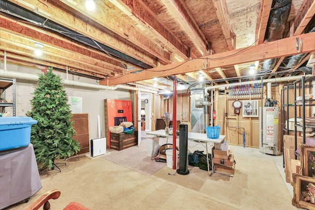 unfinished basement featuring gas water heater and carpet