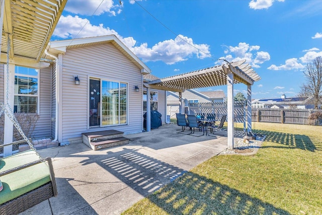 view of patio featuring fence and a pergola