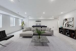 living room featuring recessed lighting