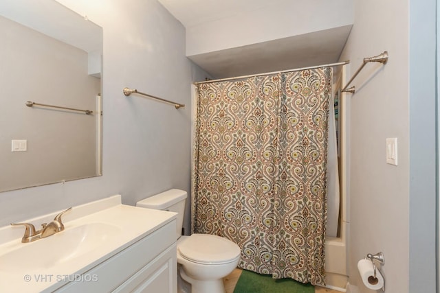 bathroom featuring shower / bath combination with curtain, vanity, and toilet