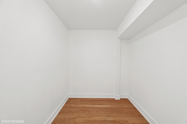 spacious closet featuring light wood finished floors