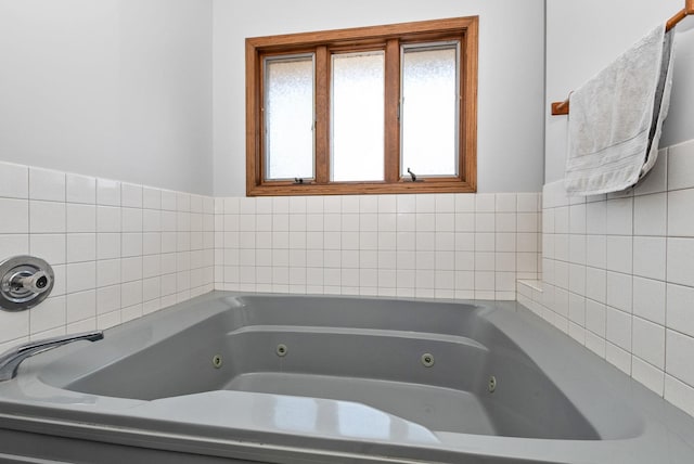 bathroom with a whirlpool tub