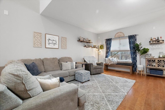 living room with wood finished floors