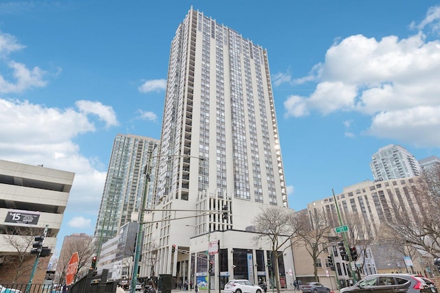 view of building exterior featuring a view of city