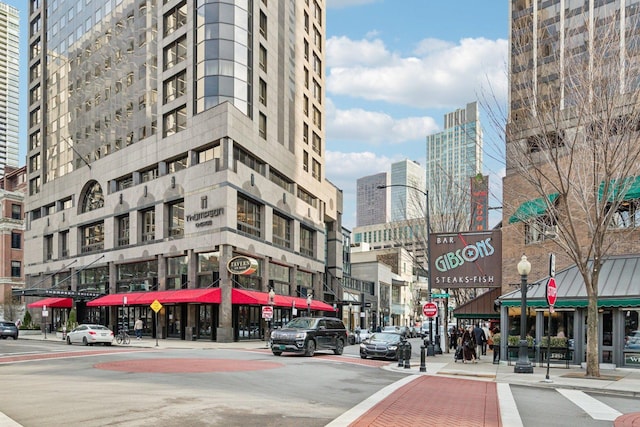 view of building exterior featuring a view of city