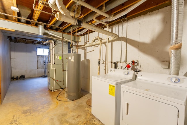 below grade area with water heater, washing machine and dryer, and heating unit