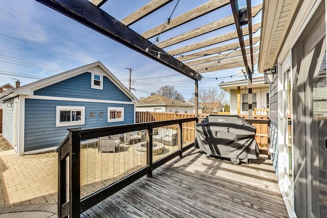 wooden terrace with a pergola