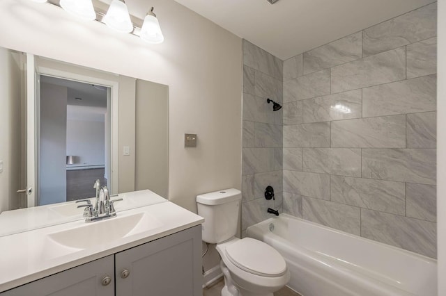 full bath featuring vanity, toilet, and tub / shower combination