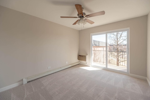 carpeted empty room with a wall mounted air conditioner, a ceiling fan, a baseboard heating unit, and baseboards