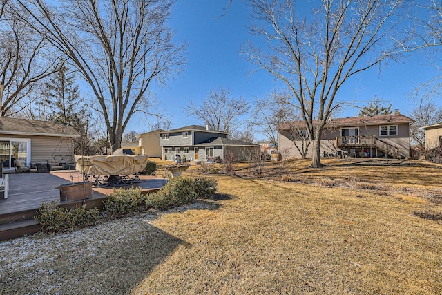 view of yard with a deck