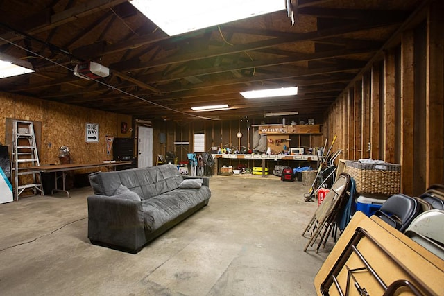 garage with a workshop area