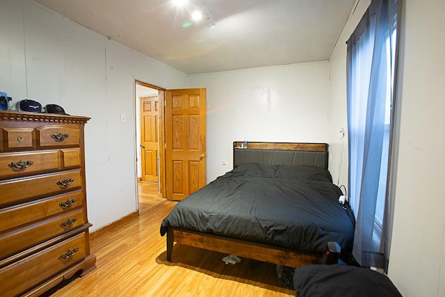 bedroom featuring light wood-type flooring