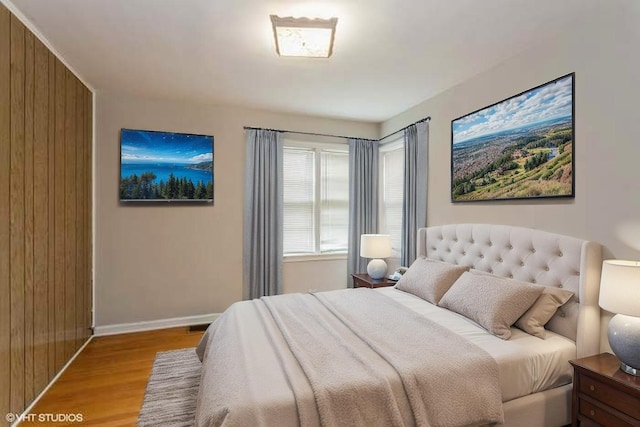 6118 N Kimball Ave, Chicago, IL 60659 - bedroom with baseboards and wood finished floors