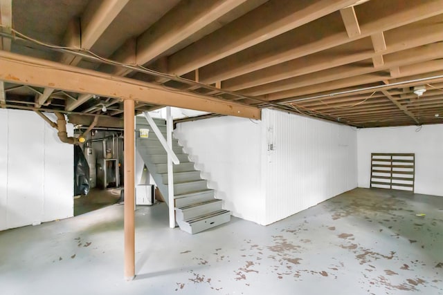 unfinished basement with stairway