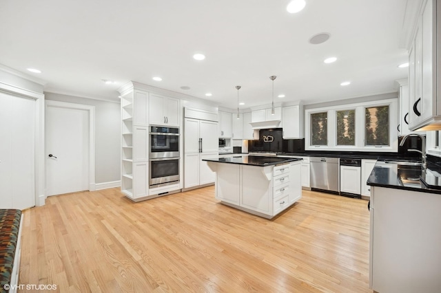 kitchen featuring open shelves, dark countertops, a kitchen island, a sink, and built in appliances