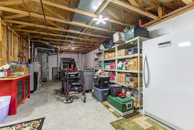 basement featuring freestanding refrigerator