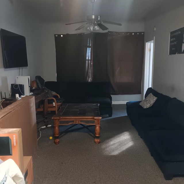 living room featuring ceiling fan and carpet flooring