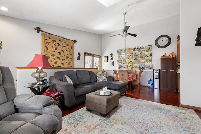 living room with baseboards, a ceiling fan, wood finished floors, and recessed lighting