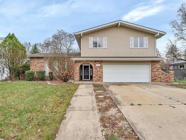 traditional home with a front yard, brick siding, driveway, and an attached garage