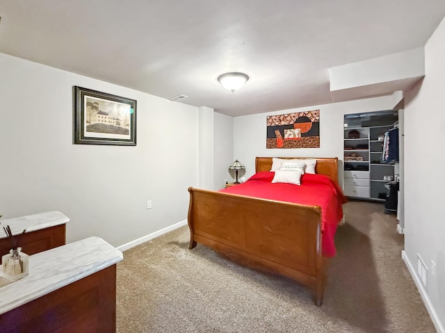 bedroom featuring carpet, visible vents, and baseboards