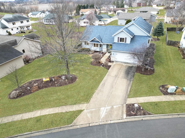 drone / aerial view with a residential view