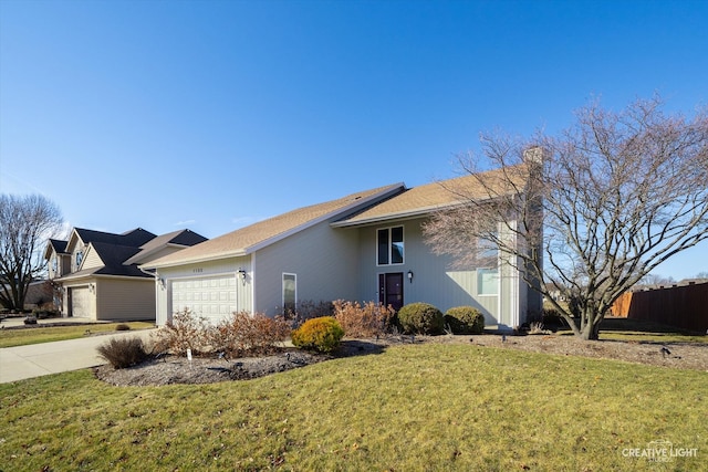 ranch-style home with concrete driveway, an attached garage, fence, and a front lawn