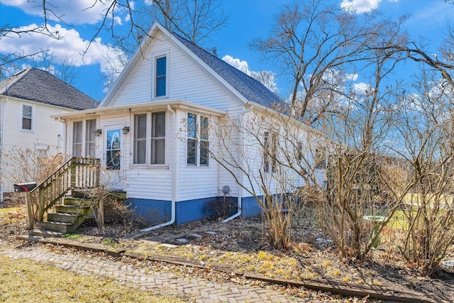 exterior space featuring a sunroom