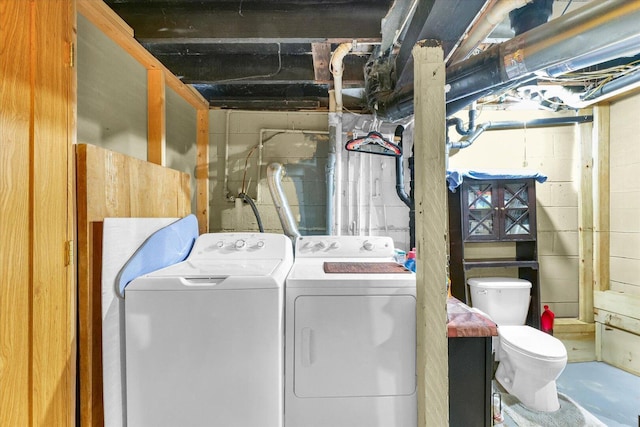 washroom featuring washer and dryer and laundry area