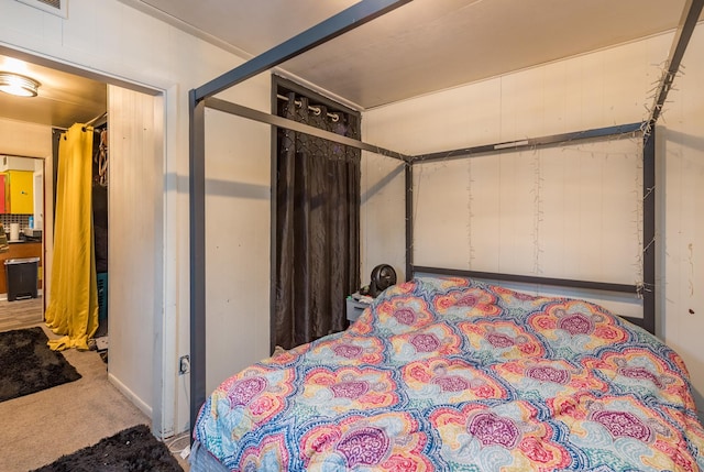 bedroom featuring a closet and carpet