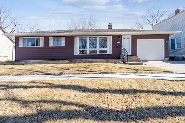 ranch-style house with a front lawn, concrete driveway, a chimney, and an attached garage