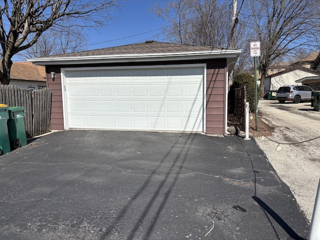 detached garage with fence