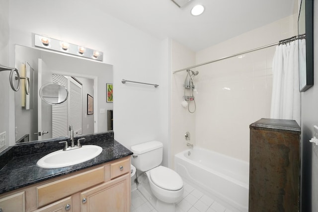 full bathroom with toilet, tile patterned flooring, shower / tub combo with curtain, and vanity