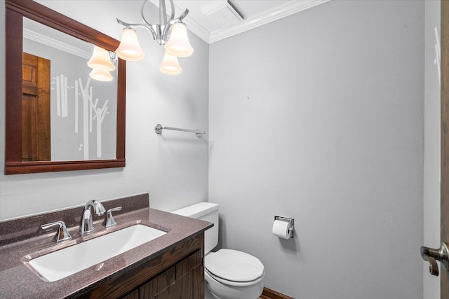 bathroom with visible vents, toilet, an inviting chandelier, crown molding, and vanity