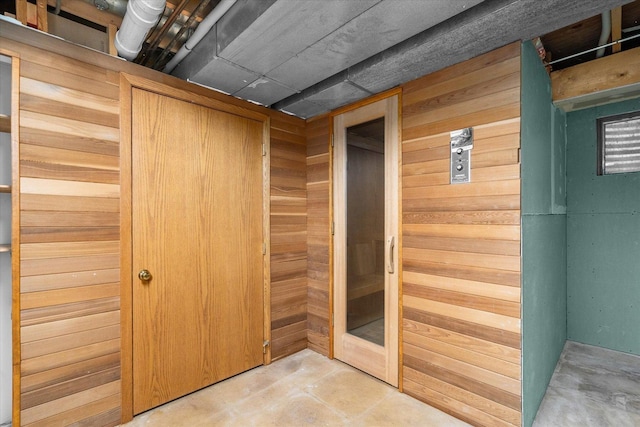 view of sauna / steam room featuring concrete flooring