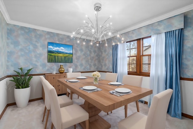 dining space with a chandelier, wallpapered walls, crown molding, and baseboards