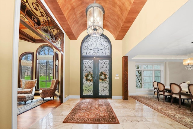 11735 Orchard St, Willow Springs, IL 60480 - entryway with french doors, baseboards, a chandelier, and crown molding