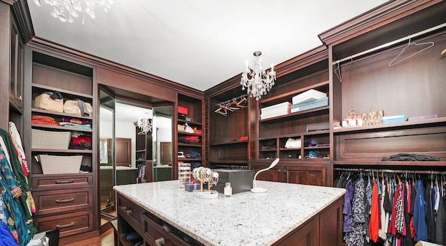 11735 Orchard St, Willow Springs, IL 60480 - spacious closet featuring a chandelier