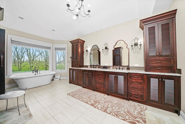 11735 Orchard St, Willow Springs, IL 60480 - full bath featuring a sink, a soaking tub, double vanity, a notable chandelier, and tile patterned flooring