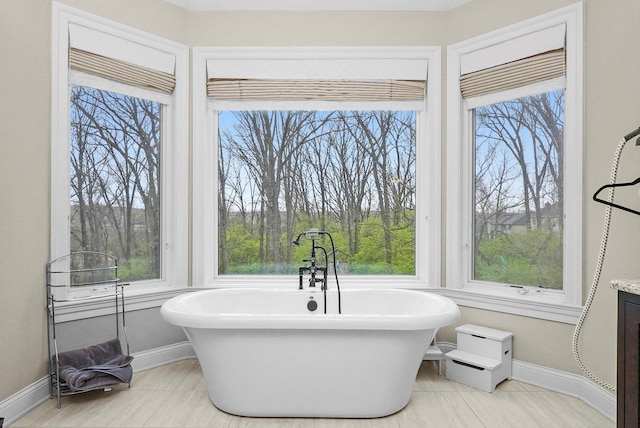 11735 Orchard St, Willow Springs, IL 60480 - full bath featuring baseboards, vanity, and a freestanding bath