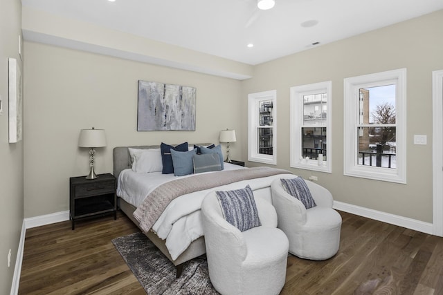 bedroom featuring dark wood-type flooring, recessed lighting, visible vents, and baseboards