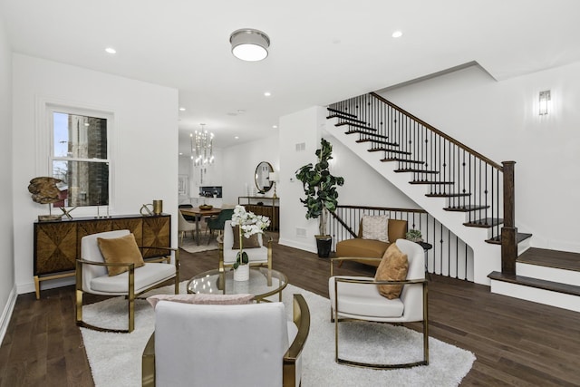 living area featuring stairs, wood finished floors, and recessed lighting