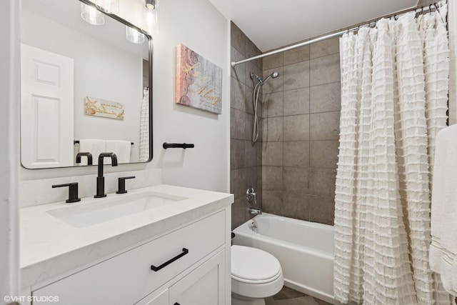 bathroom featuring vanity, shower / bath combination with curtain, and toilet