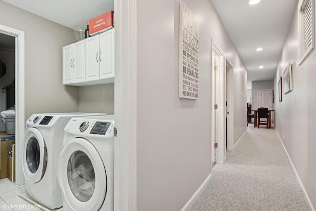 clothes washing area with recessed lighting, light colored carpet, independent washer and dryer, and baseboards