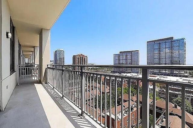 balcony featuring a city view