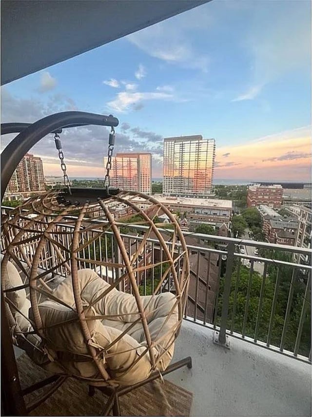 balcony featuring a city view