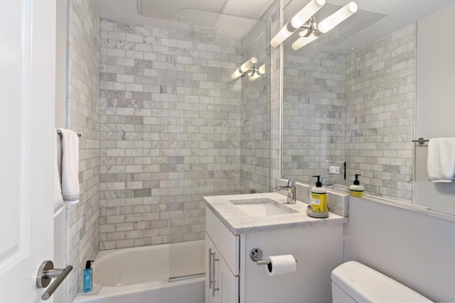 full bathroom featuring vanity, toilet, and bathing tub / shower combination