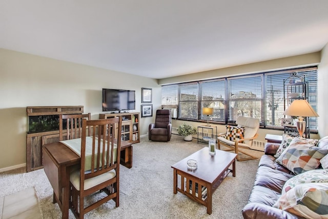 living room with baseboards and carpet floors