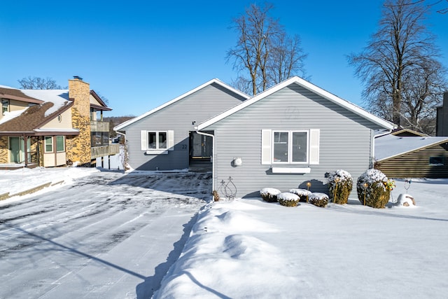 view of snow covered property