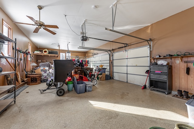 garage featuring a ceiling fan and a garage door opener